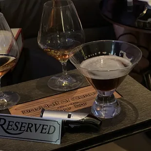 three glasses of wine on a table