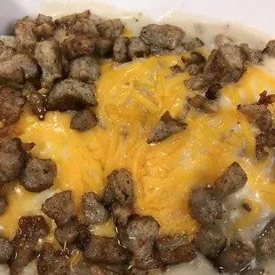Breakfast scrambler with canyon cubes, sausage, gravy and cheese.