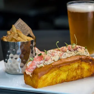 a lobster roll and a pint of beer