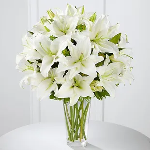 The Spirited Grace™ Lily Bouquet offers sweet serenity with every fragrant bloom. Bright white Oriental lilies create a simpl...