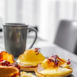 a plate of breakfast foods on a table