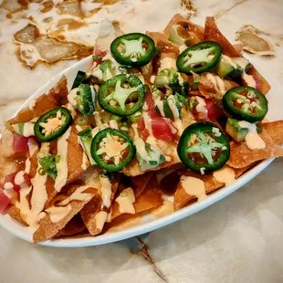 Tuna Poke Nachos for $19. NOT worth it! Tuna is frozen &amp; chewy. Yard House's version is 100% better &amp; cheaper!!