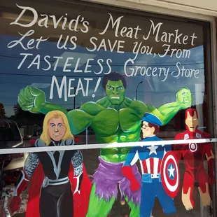 superheros in the window