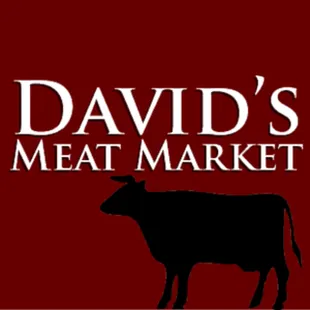 a silhouette of a cow