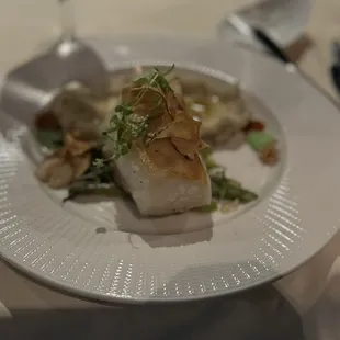 Chilean Sea Bass with asparagus and mashed potatoes.