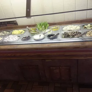 On the far left, bottom right corner is imitation crab salad. It was amazing.