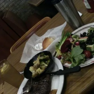 This is the ten oz sirloin with grilled veggies and toast.  The salad from the bar and a roll. Desert later.