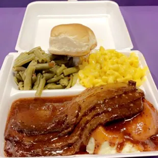 Sliced roast beef and gravy plate