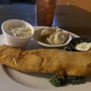Smaller portion of fried haddock, three pieroghies, and cole slaw.