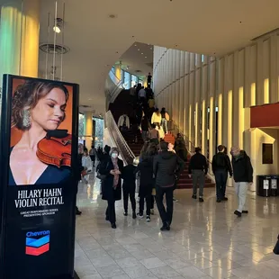 a woman playing a violin
