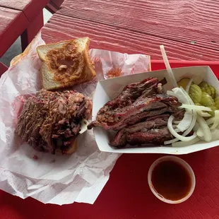 Sliced brisket sandwich was a greasy mess and lamb ribs more fat than meat. Pickles onions sauce 5-stars.