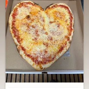 a heart shaped pizza