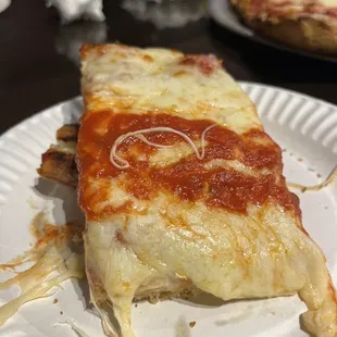 Great Sicilian slice! Cheesy, light airy crust, tasty sauce. Perfect balance!