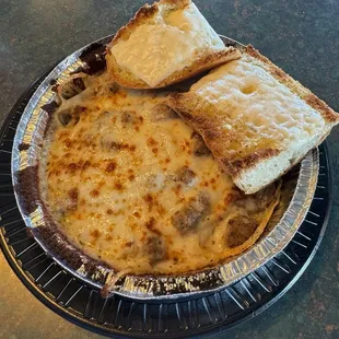 Baked pasta. Linguine with Alfredo sauce &amp; Italian sausage.