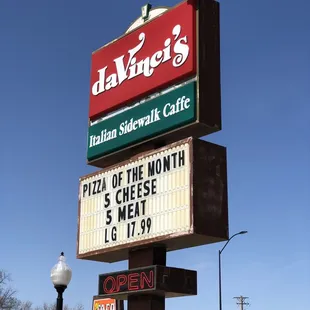 a pizza of the month sign