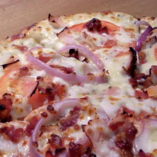 a close up of a pizza