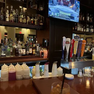 a view of a bar with a television in the background