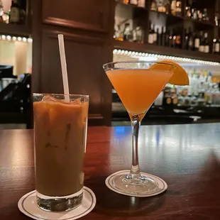 two cocktails on a bar