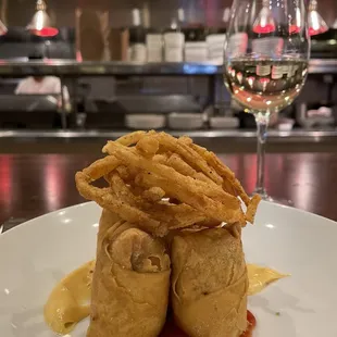 Kitchen bar seating with the spring rolls