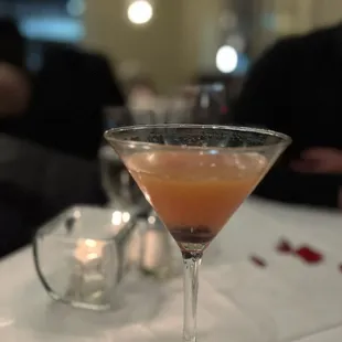 a cocktail in a martini glass