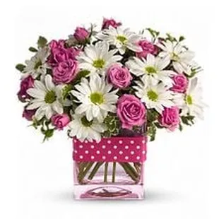 pink and white flowers in a square vase