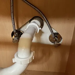 J. Garcia home. EVERY sink base is sloppy. One big hole is unacceptable! What are the escussions for?