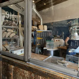 a view of the kitchen through the window
