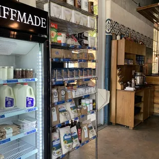 a view of the counter and refrigerator