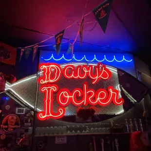a neon sign in a bar