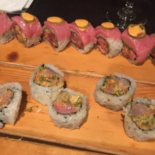 Yellow Yellowtail Roll at the bottom. Forget what&apos;s at the top