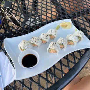 a plate of sushi on a table