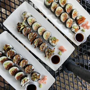 two plates of sushi on a table