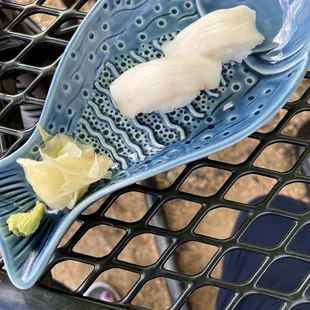 Escolar Nigiri presented on a beautiful plate