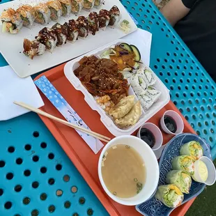Dragon Roll, another roll I don't remember the name, bento box, and the spring rolls