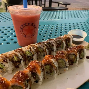 Eel roll and shrimp tempura roll with a watermelon slush
