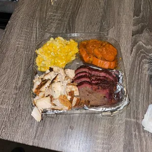 2-way- Tri-Tip with smoked chicken with a side of candied yams and Mac and cheese