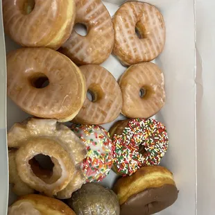 a variety of doughnuts in a box