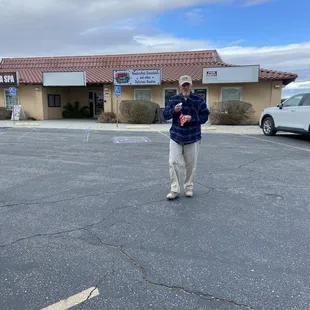 Pastor Ronnie sneaking away with a white chocolate w/peanut butter DELIGHT !!...LOL !!