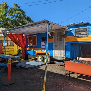 a blue and orange food truck