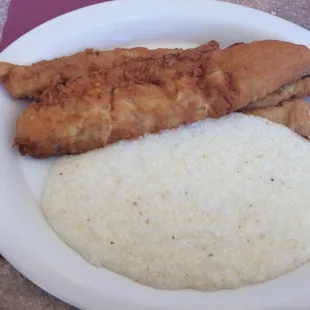Fish and grits. Fish is so good! Crispy on the outside, soft on the inside.