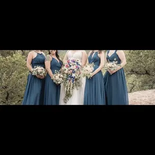 I made her add pink flowers to the bridemaid bouquets and I hated my cascading bouquet and the flowers I was able to use.