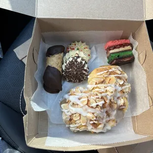 What I ordered!!  Almond bear claw  Cannoli  Sprinkle cookies  Italian rainbow cake