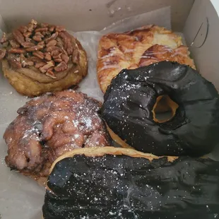 Sticky bun, cheese Danish, raised chocolate glazed, long john and apple fritter. All excellent