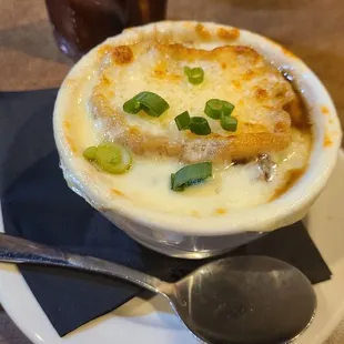 Starting with a cup of French onion soup.