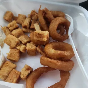 Salmon bites and onion rings.