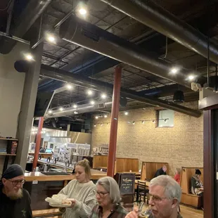 a group of people sitting at a table