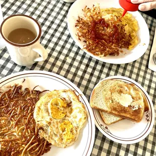 eggs, hash browns, toast and coffee