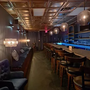 the bar and lounge chairs