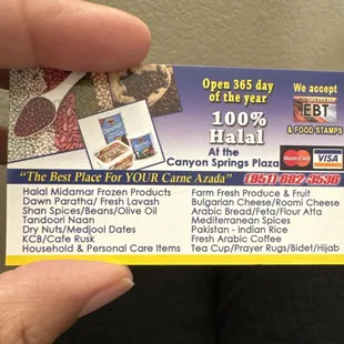 a person holding a business card