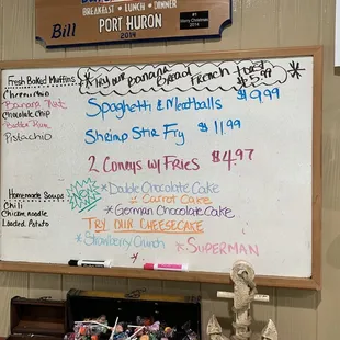 a whiteboard with a list of items on it